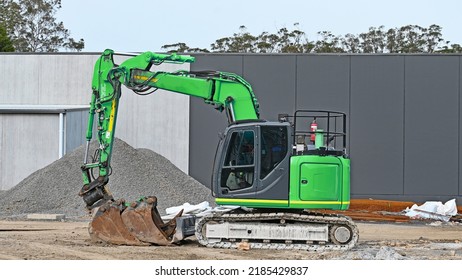 Small Excavator Or Backhoe On A Construction Site