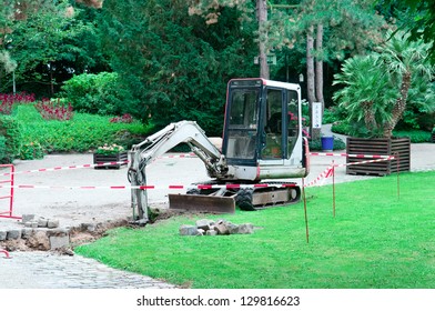 Small Excavator Working In The Park