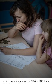 Small Family. Single Mother Has Financial Problems From Coronavirus. Her Little Daughter Calms Down Sad Mother. 