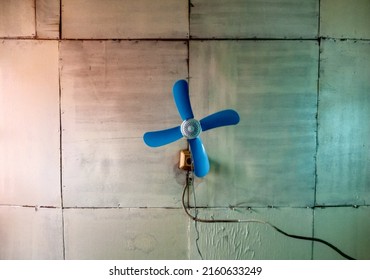 Small Fan In A Cheap Apartment Room In Southeast Asia Indonesia
