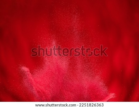 Small Fine size Sand flying explosion, Red Hot wave explode, abstract cloud fly. Red burn colored sand splash throwing Air. Volcano Lava wallpaper background high speed shutter, freeze stop motion
