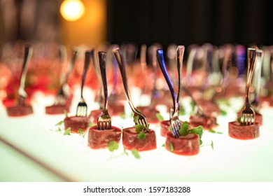 Small Fingerfood On A Fork At Event 