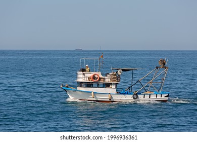 Small Fishing Boat Carrying Nets Sailing Through Karadeniz Marmara Sea. Side View. Rumelifeneri, Istanbul, Turkey - June 5 2021.