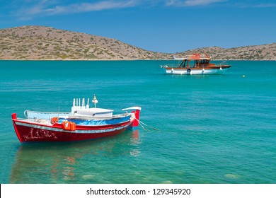 Small fishing boat at the coast of Crete, Greece