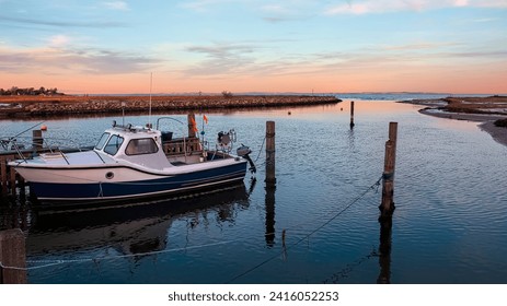 Small fishing boat in the harbour at Norsminde, Denmark - Powered by Shutterstock