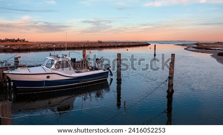 Small fishing boat in the harbour at Norsminde, Denmark