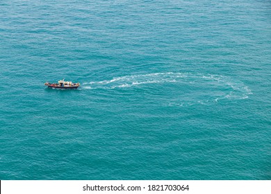 Small Fishing Boat Makes A Turn Around In Busan Area At Sunny Day, South Korea