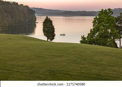 Small Fishing Boat On Acton Lake In Hueston Woods State Park, Ohio At Sunrise