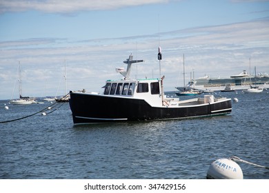 Small Fishing Boats In A Calm New England Bay