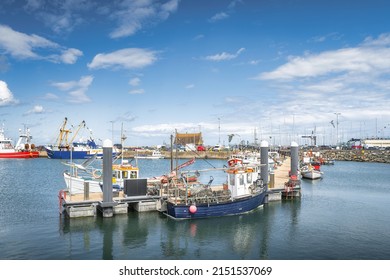 Small Fishing Boats Moored In Howth Harbour. Phishing And Shellfish Fishing Equipment On Fishing Boats, Dublin, Ireland