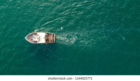 A small fishing trawler off the coast of Ayrshire, Scotland.