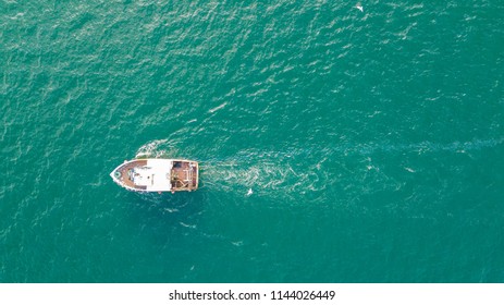 A Small Fishing Trawler Off The Coast Of Ayrshire, Scotland.