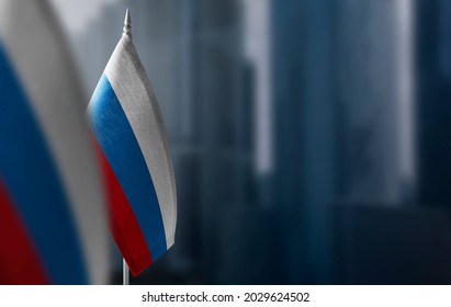 A small flag of Russia on the background of a blurred background - Shutterstock ID 2029624502