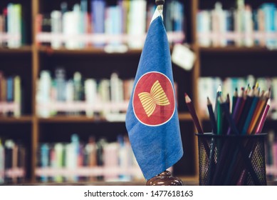 A Small Flag, The Symbol Of The ASEAN Logo On The Desk