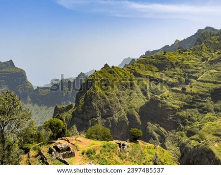A small flat area with a cattle pen among the steep volcanic mountains of the island Santo Antão, Cabo Verde