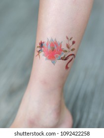 Small Flower Tattoo Sticker On Child Ankle