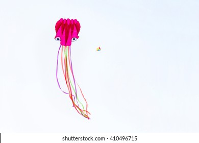 Small Flying Octopus Kite Isolated on a White Background.
