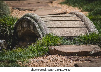 A Small Foot Bridge Over A Stream