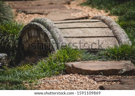 A small foot bridge over a stream