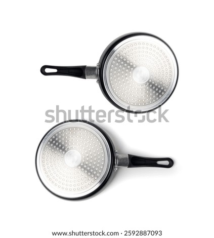 Small frying pan reverse side isolated, new non stick mini griddle, induction steel bottom cookware, single egg pan, little griddle or fryingpan on white background