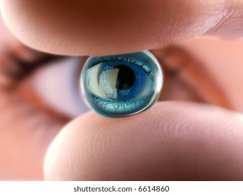 Small gel marble reflecting a woman eye. Macro shot.