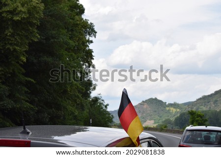 Similar – German flags on the roof of a soccer fan’s car