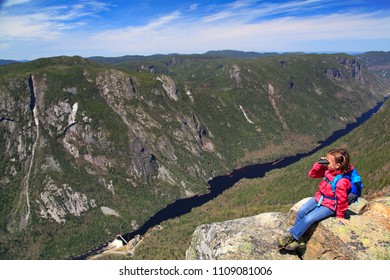 Small Girl Admiring The Landscape Of Malbaie Canyon And River From The Summit Of Acropoles Des Draveures, Hautes-Gorges-de-la-Rivière-Malbaie National Park In Quebec, Canada