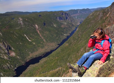 Small Girl Admiring The Landscape Of Malbaie Canyon And River From The Summit Of Acropoles Des Draveures, Hautes-Gorges-de-la-Rivière-Malbaie National Park In Quebec, Canada