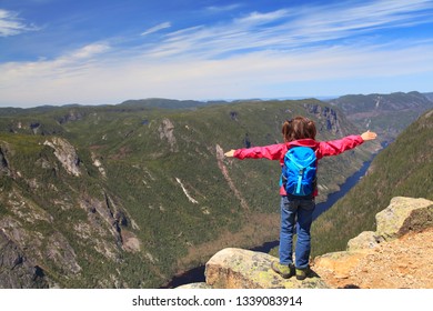 Small Girl Admiring The Landscape Of Malbaie Canyon And River From The Summit Of Acropoles Des Draveures, Hautes-Gorges-de-la-Rivière-Malbaie National Park In Quebec, Canada