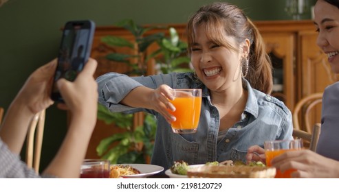 Small Girl Group Party Asia People Busy Talk Smile Eat Brunch Food Drink. Young Woman Fun Happy Hour Meal Shoot Photo Of Dish Plate Salad Bowl On Table Post Ig Reel Story App In Vegan Cafe Bar Shop.