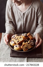 Small Girl Holding Plate Of Christmas Cake