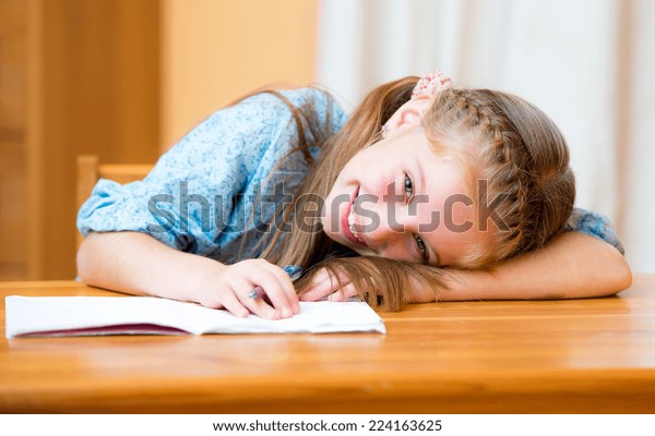 Small Girl Lying On Desk Classroom Stock Photo Edit Now 224163625