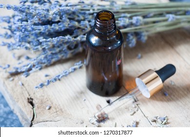 Small glass bottle with fragrance lavender natural oil