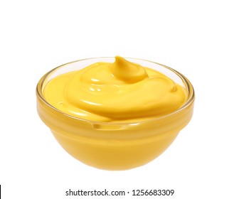 Small Glass  Bowl Of Yellow Sauce  Isolated On White Background.Creamy Cheddar Sauce