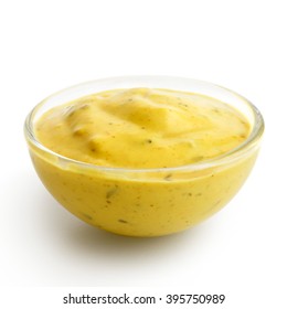 Small Glass Condiment Bowl Of  Yellow Curry Sauce. Isolated In Perspective On White.