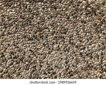 Small gravel wall Mix with white, black gray stone to make a wall or floor in the building. Houses Used as a background. copy space.