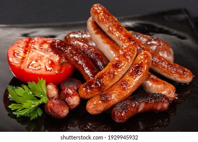 Small Grilled Sausages With Tomatoes