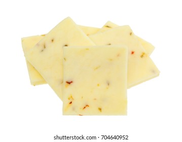 Small Group Of Fresh Pepper Jack Cheese Squares Isolated On A White Background.