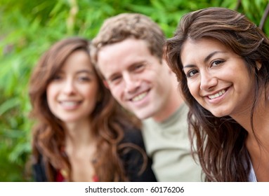 Small Group Of Friends Outdoors And Smiling