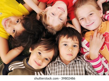 Small Group Of Happy Children Outdoor