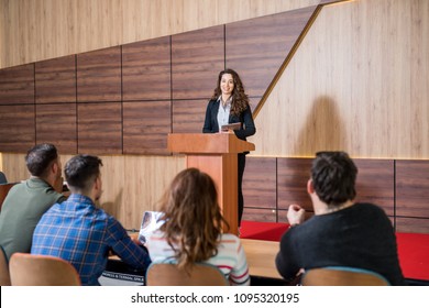 Small Group Of People Talking At A Business Convention.