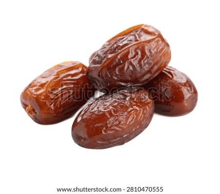 A Small Group Of Seedless Dates Full Body Isolat Isolated On White Background