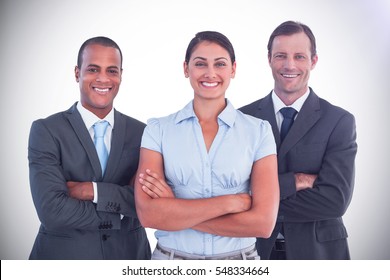 Small Group Of Smiling Business People Standing Together On White Background