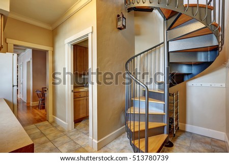 Small Hallway Interior Spiral Metal Staircase Stock Photo