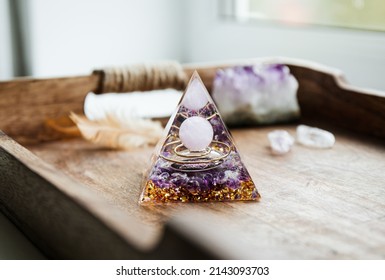 Small Home Altar With Orgonite Or Orgone Pyramid Indoors. Converting Negative Energy To Positive Energy And Have Healing Powers.