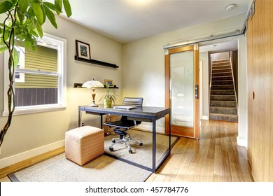 Small Home Office Interior With Hardwood Floor. View Of Staircase. Northwest, USA