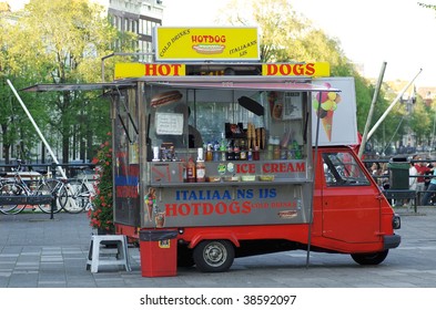 A Small Hot Dog Car In Amsterdam.