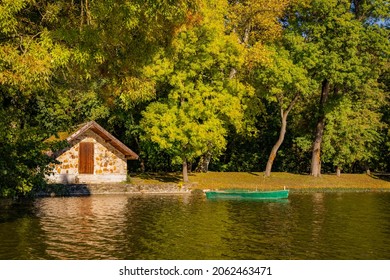 Small house with boat on the lake