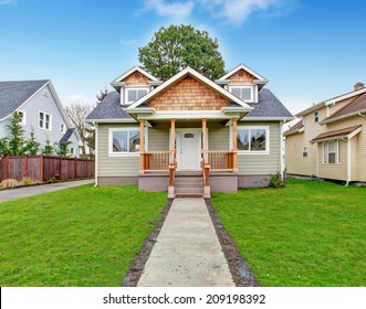 Small House Exterior. View Of Entrance Porch With Stairs And Walkway