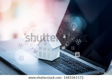 Similar – Foto Bild Ein Haus auf einer Computertastatur. Rechnungen online bezahlen. Haus und Nebenkosten. Elektrizität, Heizung, Wasser und Gas. Energie-Effizienz. Elektronische Dokumentation in Registern. Registrierung von Eigentum.